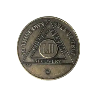 AA Recovery token with unity symbol celebrating 52 year
