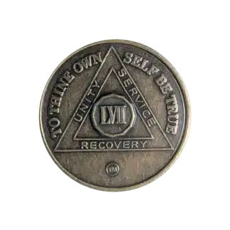 AA Recovery token with unity symbol celebrating 57 year