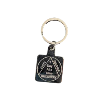 AA metal serenity keyring engraved with Grant me serenity courage wisdom on one side and circle triangle on the front.