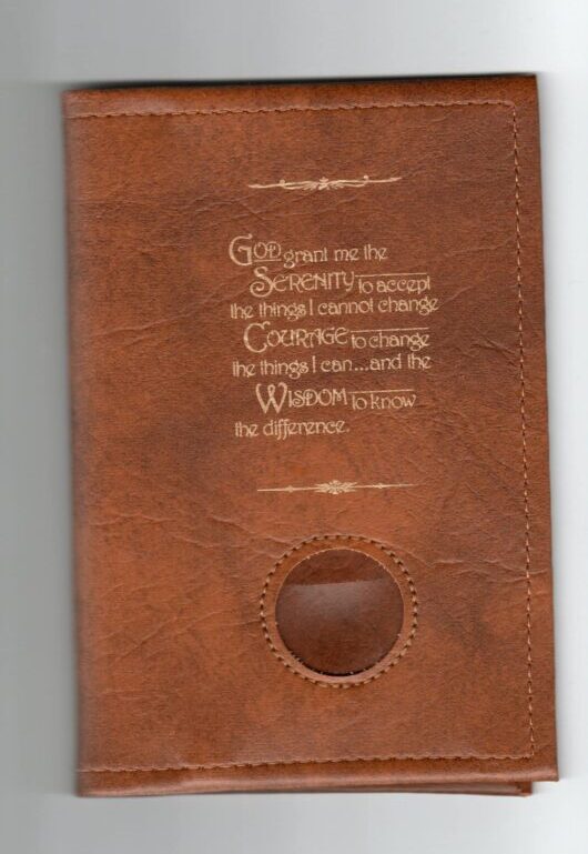 Front cover of a mini Big Book in tan, featuring a minimalist design with smooth texture and subtle embossed title lettering. Compact and elegant, the book evokes a sense of warmth and simplicity